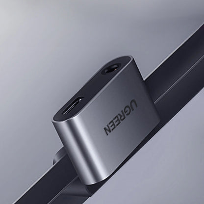 Audio adaptér USB-C - 3,5 mm / USB-C UGREEN CM193, šedý 